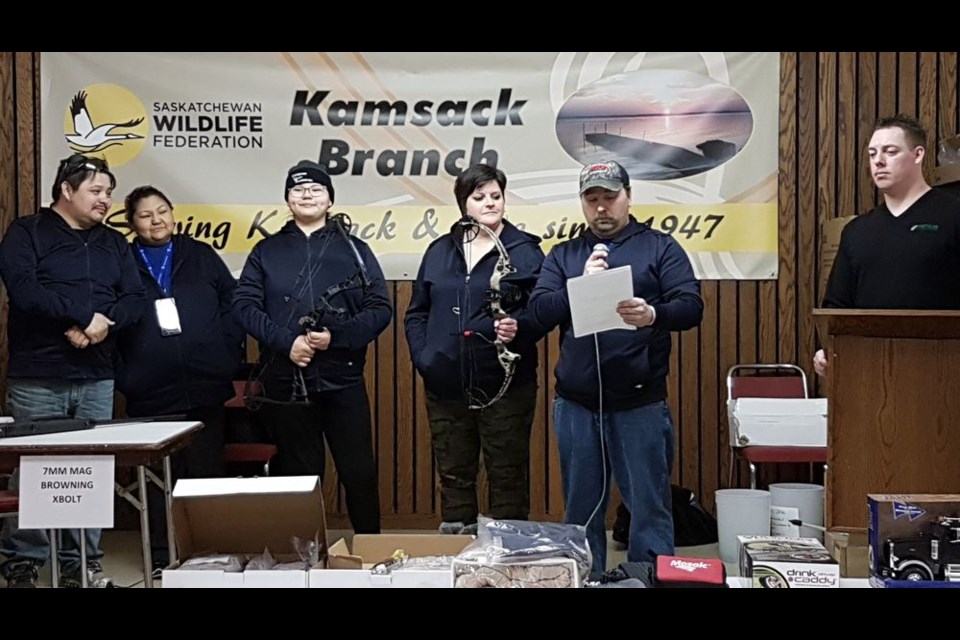 Scott Green, president of the River Valley Archery Club (RVAC), presented an update of events of the past year for the Club. From left, were: Alvin Quewezance, Lenora Quewezance, Lilyanna Quewezance, Rhonda Streelasky, Green and Tyson Leis (Kamsack SWF vice-president.)