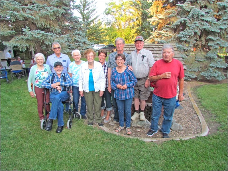 Birthday celebrants Helen Sutherland, Ron Bezugly, Laura Loeppky, Barb Leschysyn, Ron Mills, Gary Palmer, front - Sheldon Carr, Jean Sawchyn, Sue Mills and Mel Kuntz. Photos by Lorraine Olinyk