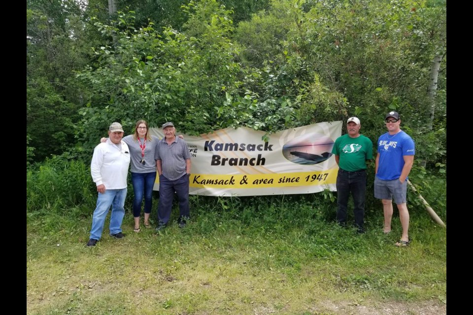 Members of the Kamsack branch of the Saskatchewan Wildlife Federation who organized the annual Kids Fishing Derby on July 20, from left, were: Jim Beauchamp, Alison Stefiuk, Walter Lesiuk, Jack Erhardt and Tyson Leis. Helping out that day were Leanne Green and Al Wonitowy who were unavailable for the photo.