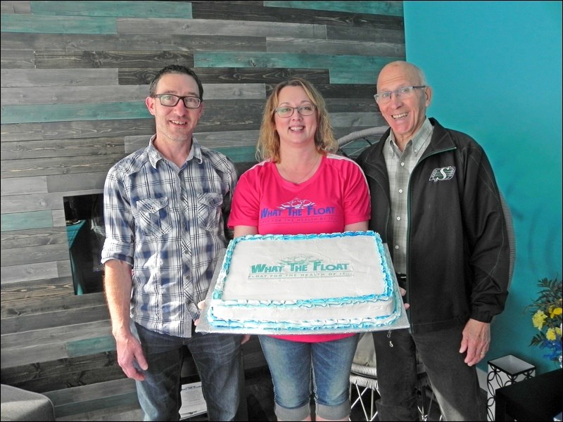 Mayor Ben Weber congratulates a new business on their grand opening Sept. 21. What The Float is a new wellness business that has opened on Main Street in Unity, offering float therapy, massage therapy and a ladies only gym. Photo by Sherri Solomko