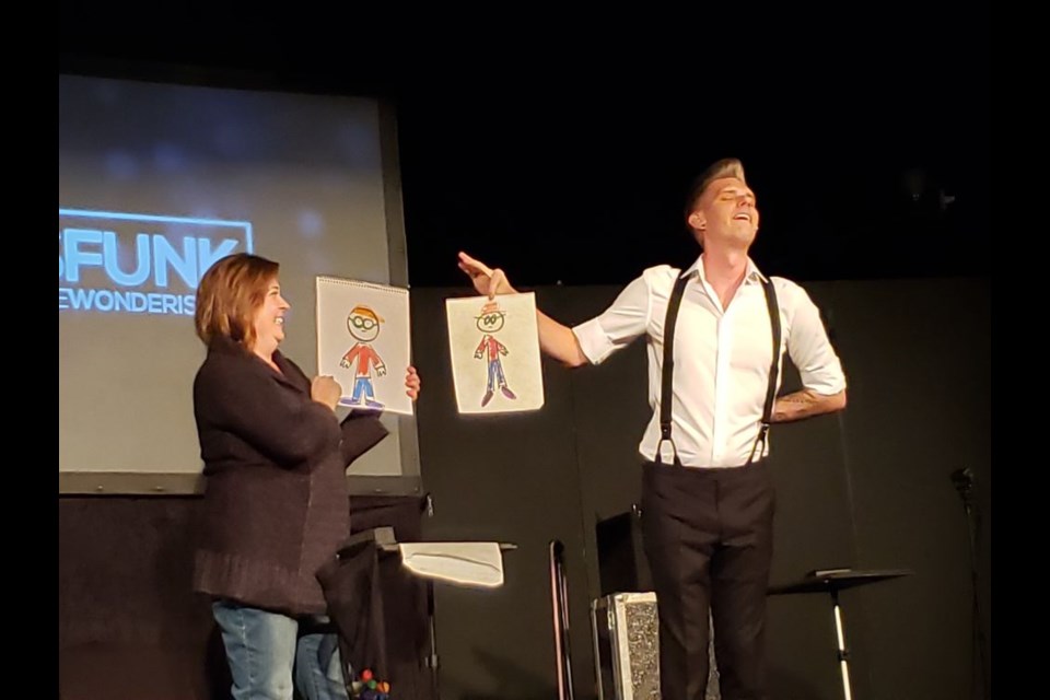 Wendy Shabatoski went on stage to assist Chris Funk with a magic trick involving “arts and crafts.”