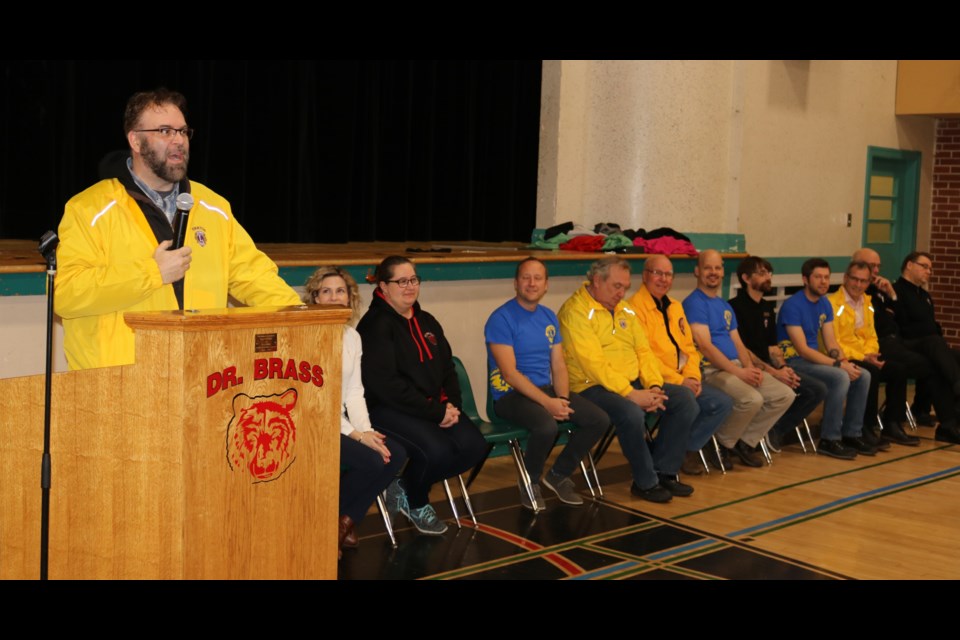 Lion Denny Vachon speaks to Dr. Brass School students Friday.