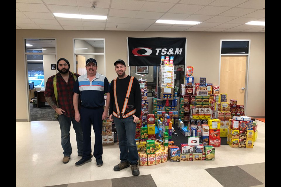 From left, Josh Bath, Colton Vielander and Dallas Taillon from TS&M Supply with their display that took top spot. Photo submitted