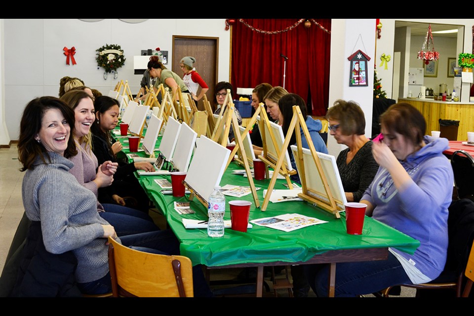 These aspiring artists have their canvases ready to go for the Creative Canvas instruction.