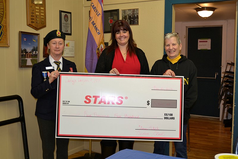 L to R: Legion President Nedra Clark, Tammy Beauregard of STARS Ambulance and Legion Treasurer Clareen Makelki. Beauregard graciously accepts a cheque for $5,200 from Royal Canadian Legion Branch #248.