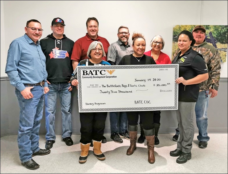 Back row - Councillor Lux Benson (Red Pheasant), Chief Kenny Moccasin (Saulteaux), Mayor Ryan Bater,