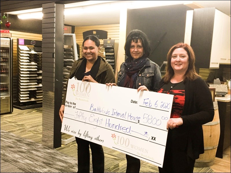 Rita Panapasa of Battlefords Victim Services accepts February’s funds from 100 Women Who Care The Ba