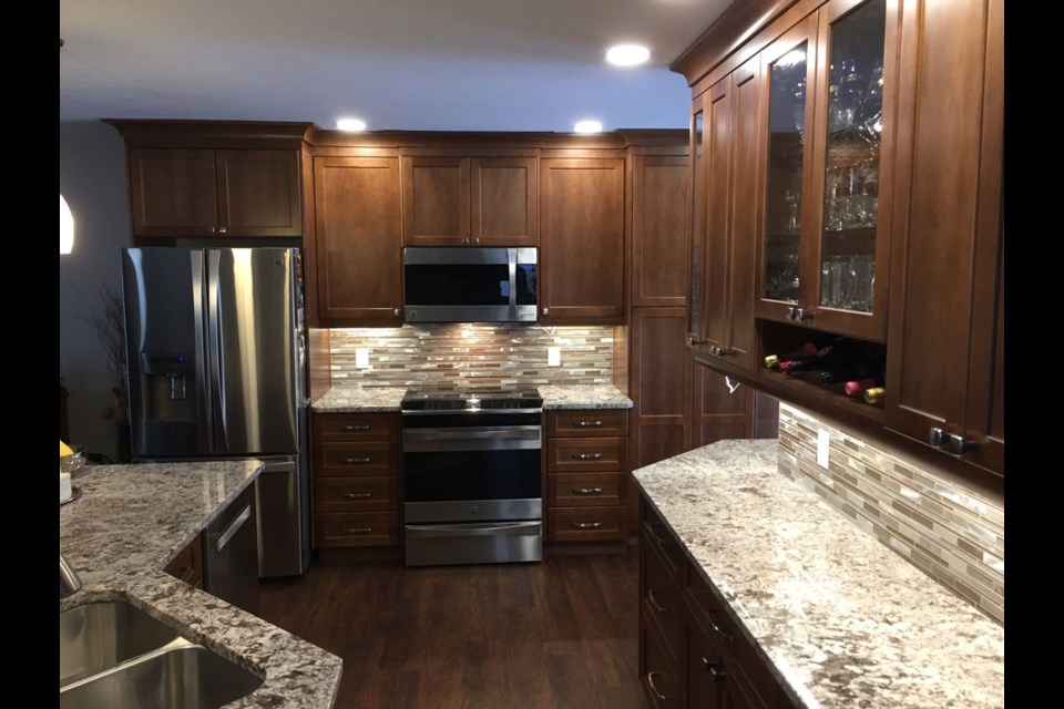 A custom kitchen Sector 1 supplied and installed, including a tile backsplash. Photo submitted