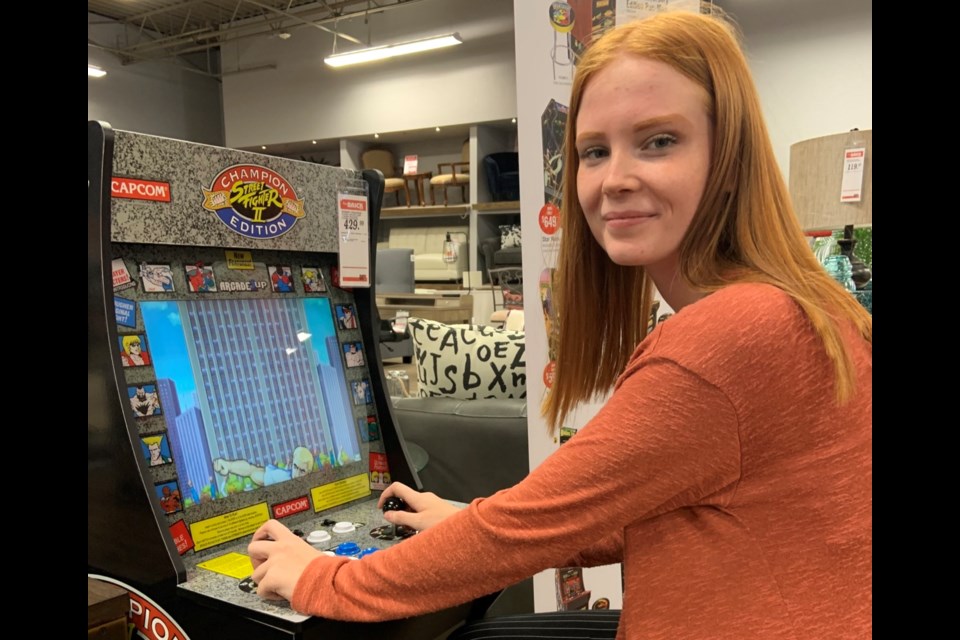 Tulilla Lemoine is pleased The Brick is now selling old-scale arcade games. Photo submitted