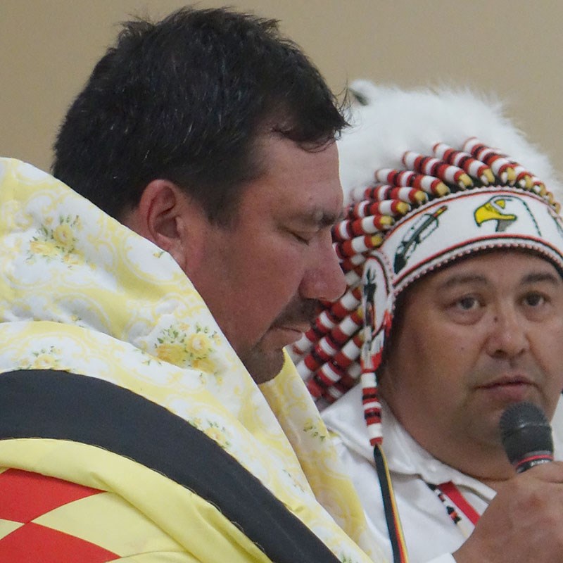 Fox Lake Cree Nation Chief Billy Beardy, left, received an eagle feather from Keewatin Tribal Counci