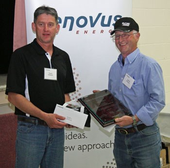 Duane Walkeden (left) of Cenovus presented a $5,000 cheque to Garnet Peterson (Cenovus consultant) for the Angus Campbell Centre for Drug and Alcohol Recovery.