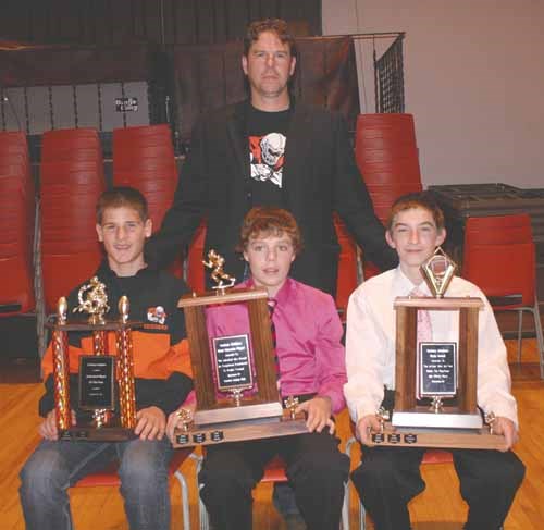 Pee wee Gridder award winners. Seated are Cole Burkholder (Defence MVP), Nick Payne (MVP), Jonathan 'Nitetrain' Nagy (the Rudy award).