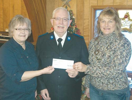 Salvation Army, Left to right, Debby Marriott, SaskTel; Envoy Roy Bladen, Salvation Army; Lori Yesnik, SaskTel.