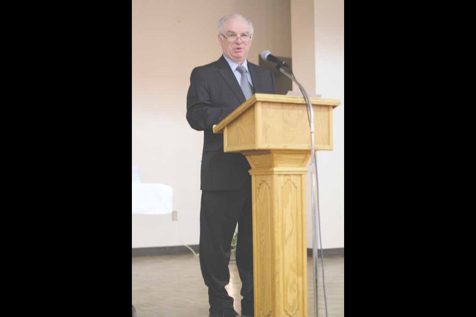 Mayor Bob Maloney makes some opening remarks at St. Mary's Cultural Centre March 8 in celebration of International Womens Day.