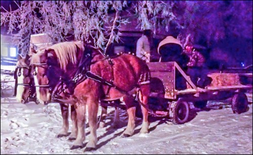 Albert and Emma Duhaime loading the next batch of passengers for a tour of Paynton’s lights. Photos by Ellery Russell