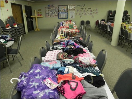 In the days leading up to Christmas, volunteers gathered to assemble gift baskets from the many items donated to Unity’s Secret Santa program. Volunteers also worked to deliver the hampers around the community.