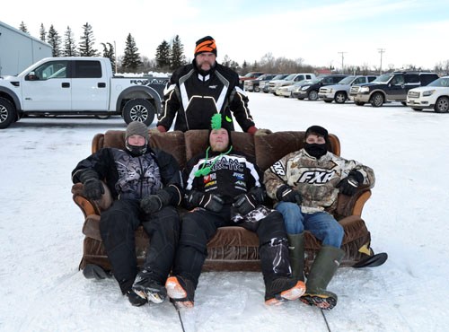 (l-r seated) Buddies Tim Englot, Travis Benner, Kourtlin Hodgson, and Taylor Hoey (standing) entertained spectators and fellow riders as they pulled a couch with Englot's quad.