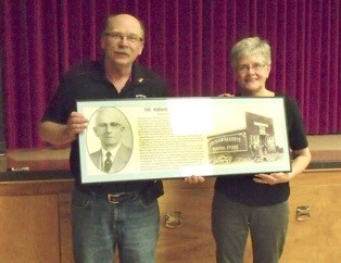 Heather Silcox presented a Norman Smith framed photo and write-up to Terry Tkaczyk, village councillor.