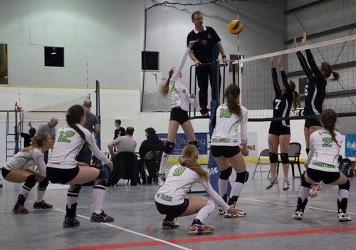 In a game versus the Swift Current Jr. Sun Dogs (ranked 4th going into provincials) Katelyn Hutt and Hailee Fleck go up for a block, with Fleck getting hands on it and dropping it to the ground for a point. Taking out the Sun Dogs sent the Vipers into Tier 1.