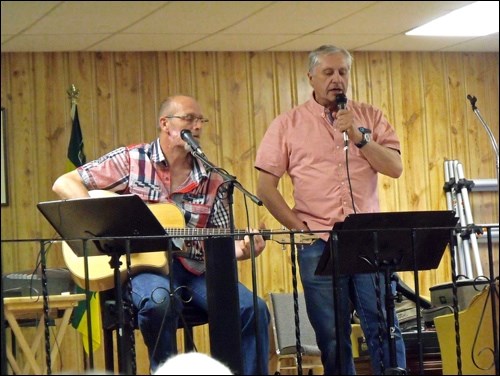 Gerald Wiebe from Radisson and Peter Thiessen entertaining April 29 at the Friendship Club potluck supper.