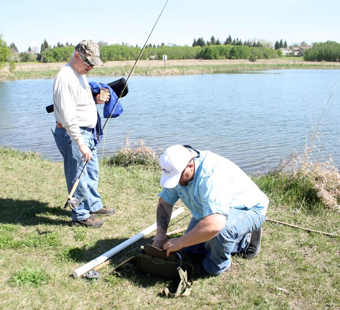 Fishing Parkland Shorelines - City trout pond attracts attention 