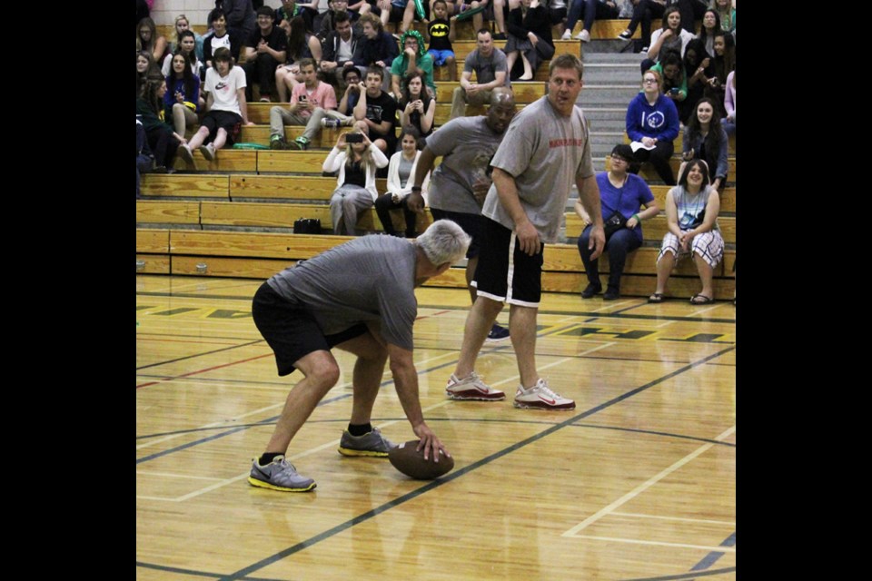 A football game took place during the celebrity basketball game. The CFL stars completed a basketball game touchdown that powered them to their 33-27 victory.