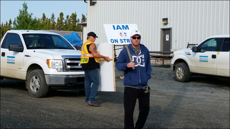 IAM picketers Norm Benko and Travis Ford