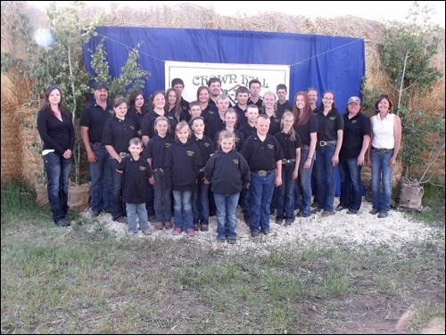 Crown Hill 4-H Club: All of the members of Crown Hill 4-H Beef Club with judge Tiffany Peters and general leader Richard Yasieniuk on the left and assistant leader Donna Verbonac and judge Virginia Peters on the right.