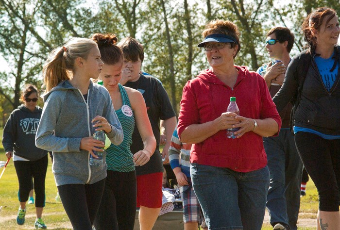 Red Shoe Walk Ronald McDonald House Charities – Saskatchewan celebrated thirty years of keeping families together during a medical crisis this past Saturday. Sunday was the day for Yorkton to celebrate at the inaugural Red Shoe Walk at Logan Flats during the afternoon. Built in 1985, “The House that Love Built” was constructed in Saskatoon to support thirteen families. Twenty-nine years and an expansion later, the house accommodates 34 families. The only thing that has not changed is the price. $10 per night is the cost that was set in 1985 so that families would be able to afford accommodations while also paying for their child’s medical expenses. Guests at the house shared their stories and gave their thanks to the volunteers that have kept the house open. 2, 3, 5 and 7 kilometre walks were marked, along with fun factual signs along the trails for attendees. The Ronald McDonald House Charity reminds everyone that the house is not based on economic need, but the need of the child in medical crisis.