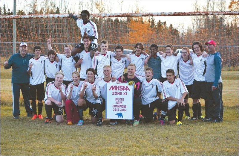 Hapnot Kings soccer team consists of (back, from left) coach David Green, Justin Nixon, Jeremy Parker, Myles Quick, Will Hatherley with Branson Powell (on shoulders), Cole Reierson, Dominic Ruckle, Brandon Kolt, Vishwaka Epa, Tyler Wiens, Parker Mathews, Logan Sapergia-Green and coach Tyler Kittle; and (front) Evan Hooper, Jordy Reykdal, Nathan Whitbread, Tayler Kittle, Eric Rutherford, Isaac Jays and Mason Tower.