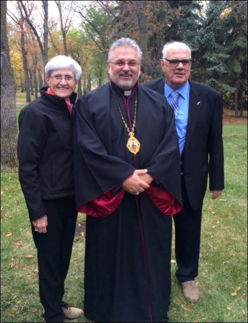 LOCCS board member Adrienne Welter, Most Rev. Bryan Bayda and LOCCS board member Keith Koberinski at the unveiling of the monument.