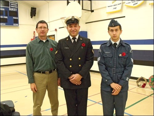 Deputy Mayor Tony Marten, marine Brian Gabrysh and cadet Dyllan Tracksell laid wreathes at the Borden School Remembrance Day service. Photos by Lorraine Olinyk