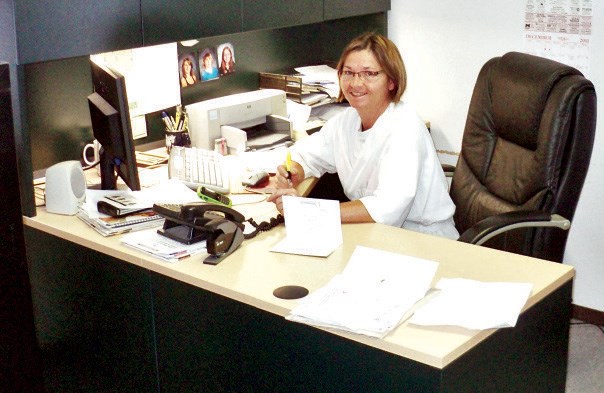 DR. DEBBIE HUPKA-BUTZ IN HER OFFICE