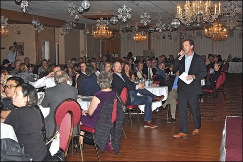 The highlight was the auction itself. The were 23 items up for bid in the live auction as well as more than 130 items up for bid in the silent auction. Kramer Auctions Ltd. auctioneer Michael Higgs is seen here taking the bids from the floor on the various items. At one point they had Bishop Thevenot do some auctioneering, a hilarious moment that proved to be a high point of the evening.