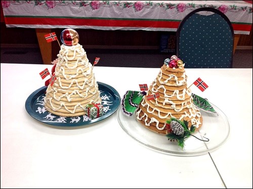 Kransekake, a Norwegian celebration cake, was tackled by a group who gathered at the Do Drop In to prepare food for a Norwegian feast.