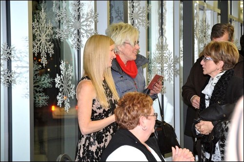 Karen Ennis talks with fans after the show. The audience found out she can not only sing, play the Irish flute and dance, she is also funny.