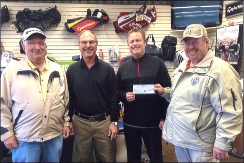 The Associated Canadian Travellers’ annual draw for a year’s membership at the North Battleford Golf and Country Club was won this year by Gary Flickel (second from the left). Also picture is golf club professional Dana Johnson accepting a cheque for $700 from ACT member Dale Cain. Also pictured on the left is ACT member Jim Miller. Photo submitted