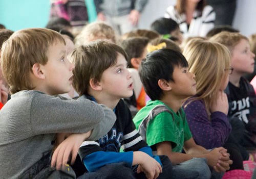 Students’ attention was captured at Carlyle Elementary School as they learned they would be receiving a new book to enjoy.