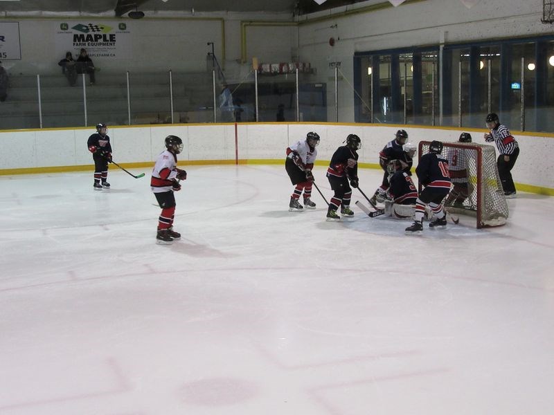 In the game between the Canora peewees and the Esterhazy White Flyers, Jake Statchuk (No.9) dug behind the net while Maxwell Mydonick (No.14) waited at the side and Clay Sleeva (No.10) waited out front.