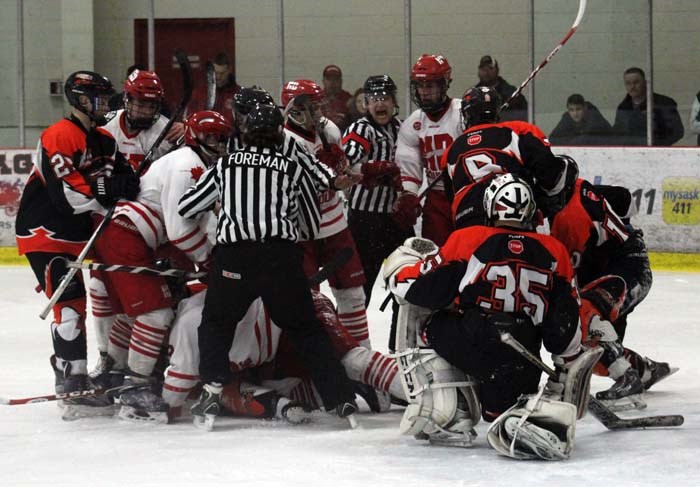 The entire series was full of after the whistle shenanigans. Here the Maulers and Hounds engage in extra curricular activities in front of the Yorkton net.