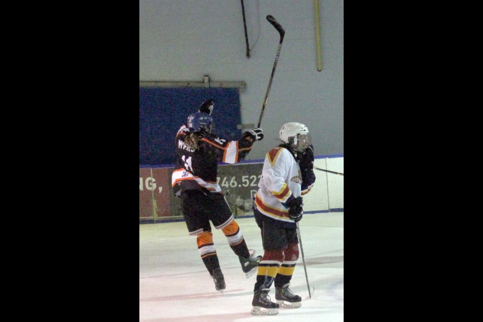 Shaelyn Myers celebrates one of her three goals that helped the Crushers sweep the Regina Cougars and advance to the SSFHL Bantam ‘A’ finals.