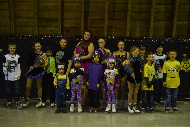 Members of the Togo Figure Skating Club, who presented their carnival entitled One in a Minion on March 6, from left, are: (back row) Aiden Stone, Maison Davis, Levon Clark, Charlotte Henderson, Tamara Delawski, Linda Konowalchuk, Kate Erhardt, Levi Erhardt and Zachary Burback, and (front) Lucas Stone, Meredith Burback, Cage Clark, Peyton Burback, Willow Davis, Max Stone and Jacob Burback. Raeleigh Burback was not available for the photo.