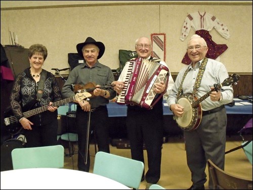 Ukrainian Connection at the museum supper March 19, Darlene Hupaelo, Walter Kyliuk, Ron Dutchak and Peter Kyliuk. Photos by Lorraine Olinyk