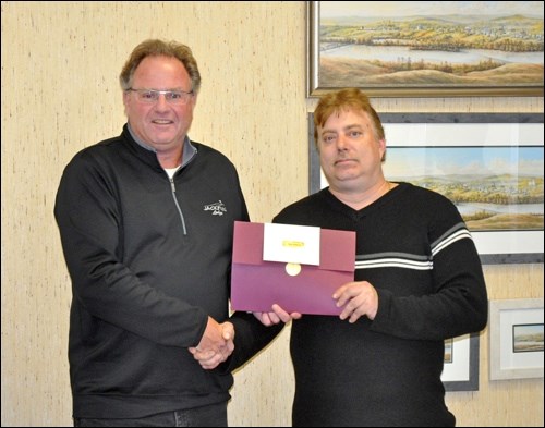 Recognition of Service — Former Town of Battleford superintendents Randy Redding and Kevin Chaykowski were presented with certificates from the Saskatchewan Urban Municipalities Association for their long-time service to municipal operations. The presentation took place at Battleford Town Hall recently, with Mayor Derek Mahon making the presentation.