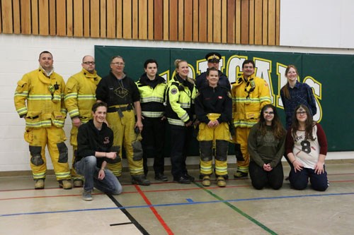 G.F. Kells’ S.A.D.D. group thanks emergency personnel from Carlyle for helping them with a mock collision on Tuesday, April 12. Pictured here are emergency responders and members of G.F. Kells’ S.A.D.D. group. (From left to right) Travis VanMeer, Adam Bee, Josh Brown (kneeling), Fire Chief Don VanMeer, Zach Brown, Mackenzie Craig, Deputy Fire Chief Michelle Orsted (front), Staff Sgt. Darren Simons (back), Brent Stillwell, Kiri Bieberdorf (kneeling), Bryanne Forcier (back), and Marissa Owens (kneeling). Missing from photo: Cst. Jeff Smoliak, Kass Ulrich, and Zach Lang.