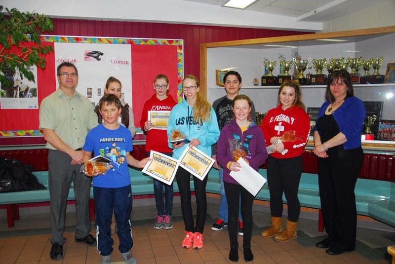 The Canora Composite School’s Students of the Month for March were presented with their certificates by Chelsea Rock of the Crossroads Credit Union last week. Recipients, with Kim Eiteneier (principal), from left, are: (back row) Hannah Scherban (Grade 11), Tessa Spokes (Grade 8), Alden Baren (Grade 7) and Abby Sakal (Grade 10) and Rock; and (front) Ethan Heshka (Grade 5), Rebecca Hort (Grade 9), Bella Mykytyshyn (Grade 6). Not available for the photo was Tanner Kopeck (Grade 12).