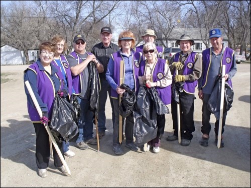 Borden Lions members ready to walk and clean the Highway 16 ditches for two miles are Sharon Assman, Bev Assman, Perry Nicol, Archie Wainwright, Janet Sparks, Bob Wardhaugh, Stephen Derbawka, Mel Wasylyshin and Peggy Wainwright, in front. Photos by Lorraine Olinyk