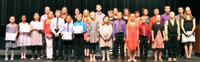 Piano Award Winners Back Row: Emily Hansen, Alex Flaman, Zoe Flaman, Amy Schmalz, Jakob Surjik, Tyler Walker, Tamantha Kirsch, Julia Breitkreuz, Madison Leister, Faith Fidek, Ivan Fidek, Nikolai Fetsch, Ben Fetsch, Sarah Walker; Front Row: Caroline Richards, Julianna Ubongen, Beatrice Molo, Rebekah Richards, Evan Richards, Dexter Candillo, Parker Hollinger, Hannah Surjik, Evia McDowell, Tryggvi Thorsteinson, Signy Thorsteinson, Angela Fetsch, Jon Fetsch; Missing: Ben Young, Chelte Young, Christine Young, Kennedy Kosheluk, Jaya Code, Gwynneth Stafford.