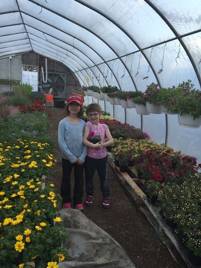 Maggie and Anebeth Bartel had fun shopping for a special flower for their mother, Welma Bartel, at Wiwcharuk's Family Greenhouse on May 6.