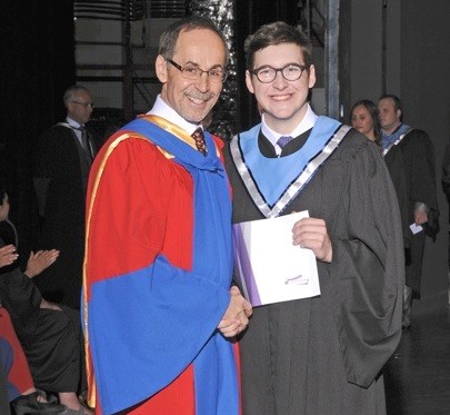 Myron Metanchuk receives his primary care paramedic certificate at the Saskatchewan Polytechnic Convocation May 27 at TCU Place in Saskatoon. In the photo are Dr. Larry Rosia, president and CEO of Saskatchewan Polytechnic and Myron Metanchuk. Photo submitted by Lorraine Olinyk